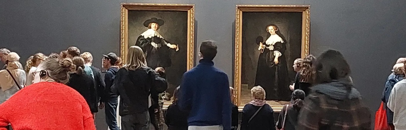 People looking at a painting