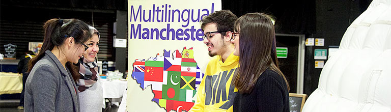Multilingual Manchester stand at a JustFest event