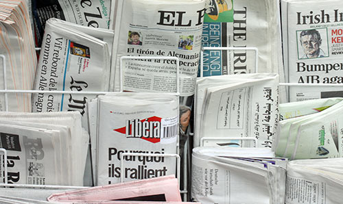 International newspapers on a news stand