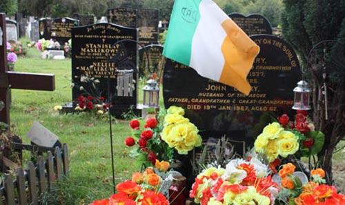 Modern cemetery with Irish flag