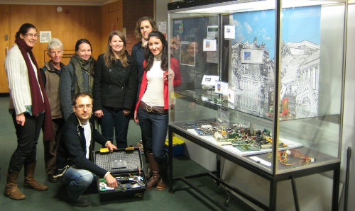 Students with their 'Small-scale Experimental Machine' display