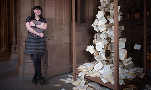 Guyda Armstrong (Senior Lecturer in Italian) with an exhibition at John Rylands Library