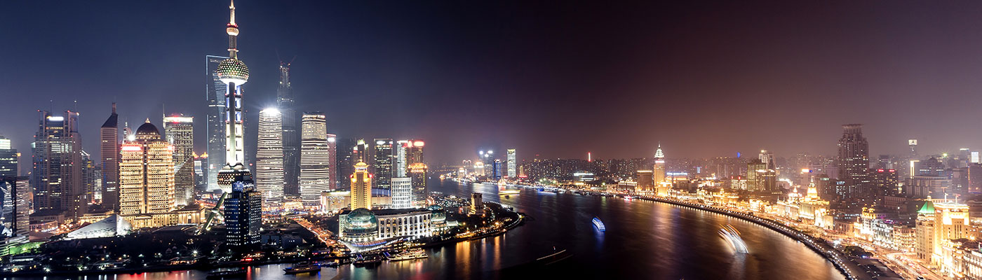 Shanghai skyscrapers and riverfront at night