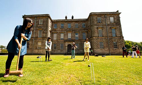Students playing croquet at Lyme Park