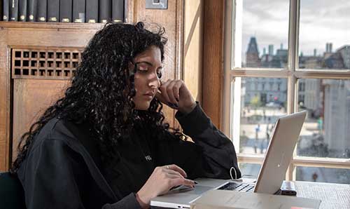 Student working in library