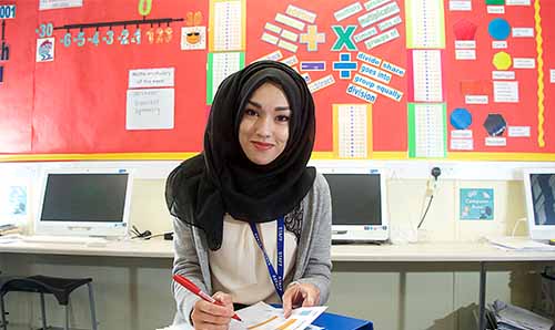 Female graduate in a school