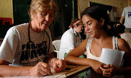 Two people demonstrating interpreting in the field 