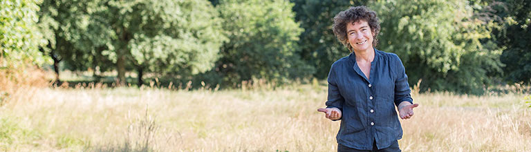 Jeanette Winterson (professor of new writing) in a field