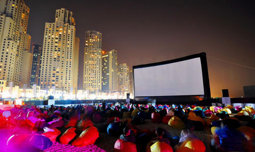 Outdoor cinema on a beach in the Middle East