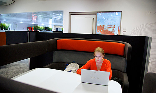 Female student working learning commons