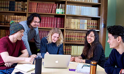 Group of students working in meeting area