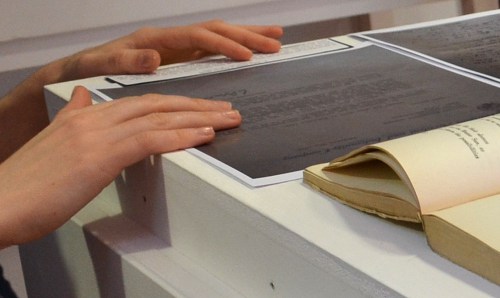 A student arranges reproductions of letters about “Botteghe Oscure”. Photo courtesy of Chiara Zuanni.