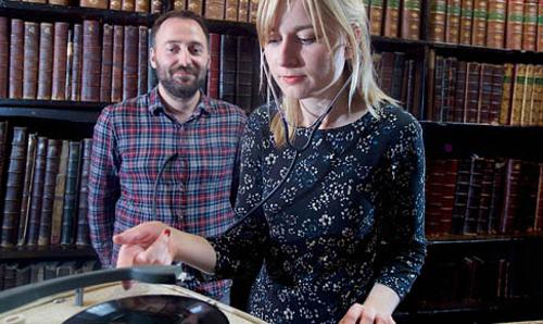 Students with the exhibition at Chetham's Library