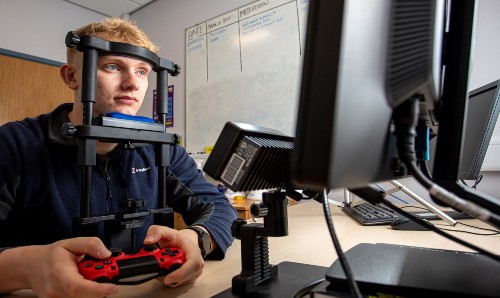 Man playing games during an experiment