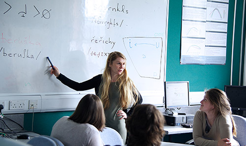 Tutor teaching a class
