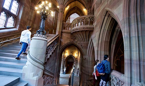 Students walking on the library stairs