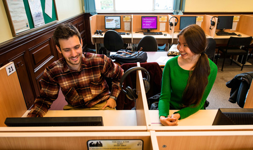 Two language students in a PC cluster