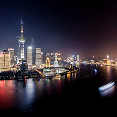 Shanghai skyscrapers and riverfront at night