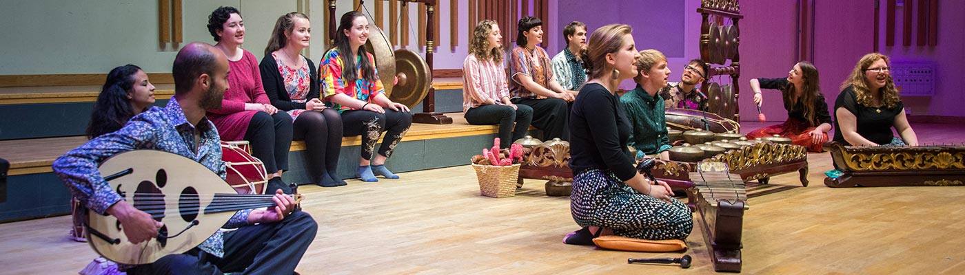 Students playing the gamelan