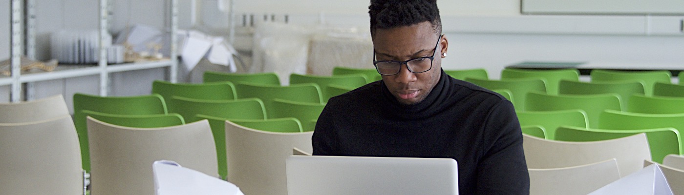 Man sat on laptop